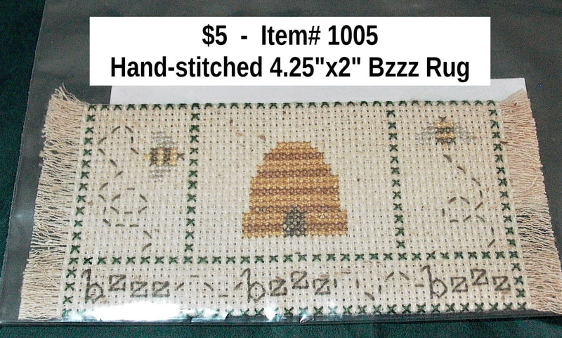 $5  -  Item# 1005  -  Hand Stitched Bzzz Carpet Measures: 4.25" x 2"