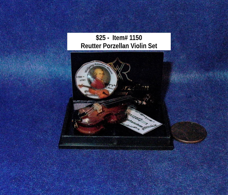 $25  -  Item# 1150 
 Reutter Porzellan Wolfgang Amadeus Mozart Violin Set