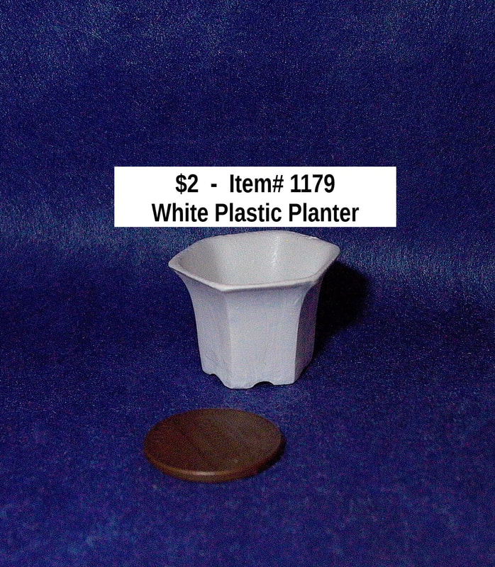 $2  -  Item# 1179 
*White Plastic Planter