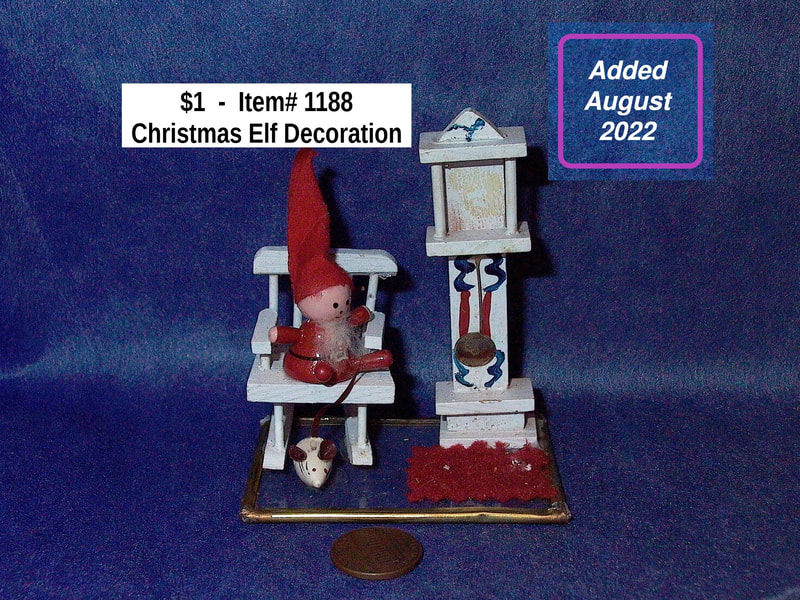 $1  -  Item #1188 - Christmas Elf Decoration
(needs TLC - Clock Face)