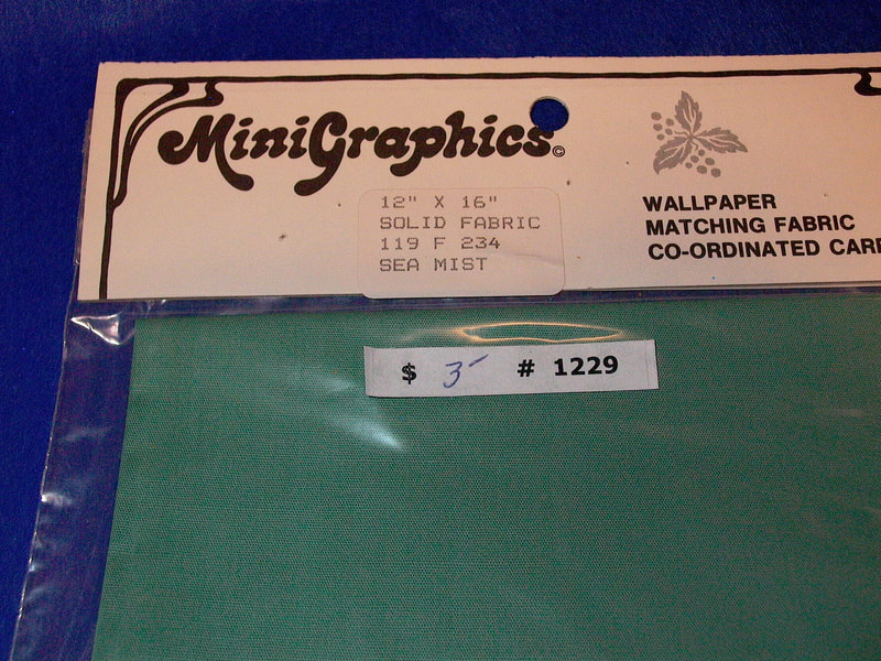 $3 - Item# 1229 - MiniGraphics Solid Fabric Sea Mist  119 F 234
- 12" x 16"