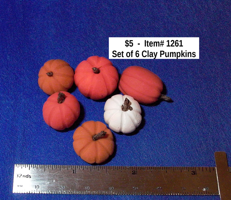 $5  -  Item# 1261
Set of 6 Clay Pumpkins