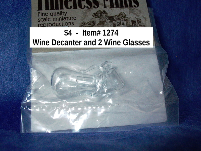 $4  -  Item# 1274 
Wine Decanter and 2 Wine Glasses