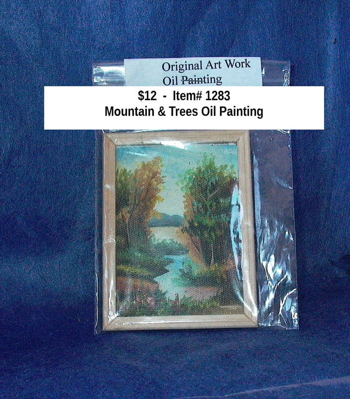 $12  -  Item# 1283
Mountain & Trees Framed Oil Painting