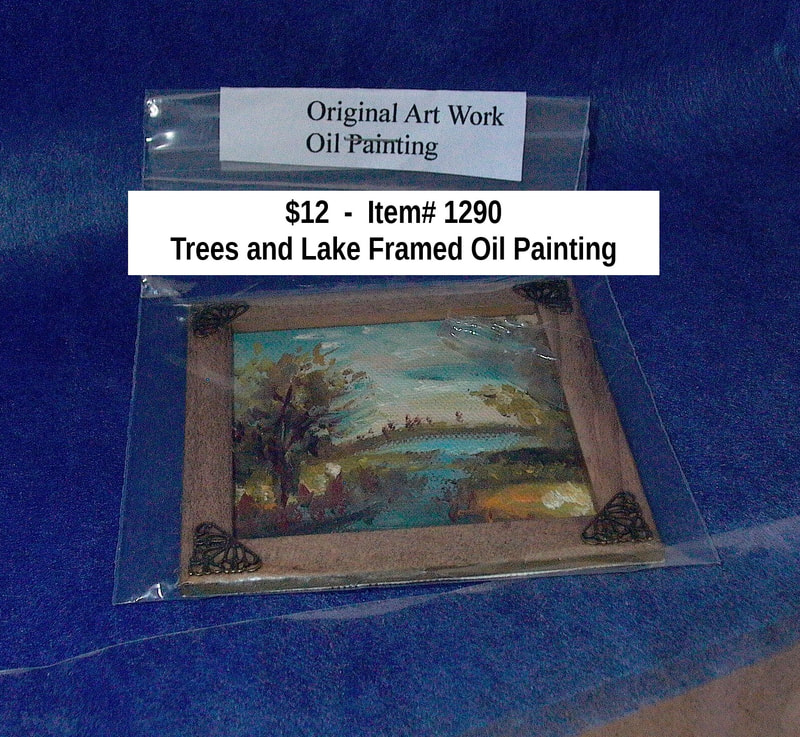 $12  -  Item# 1290 
Trees and Lake Framed Oil Painting