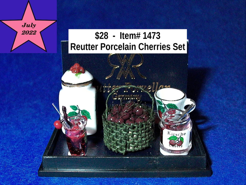 $28  -  Item# 1473 - Reutter Porcelain Basket of Cherries & More Cherry Items
