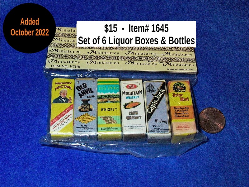$15 - Item# 1645  -  Set of 6 Liquor Boxes and Bottles 
