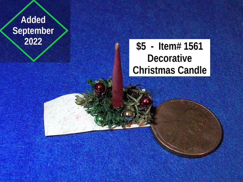 $5   -  Item# 1561  - 
Decorative Christmas Candle