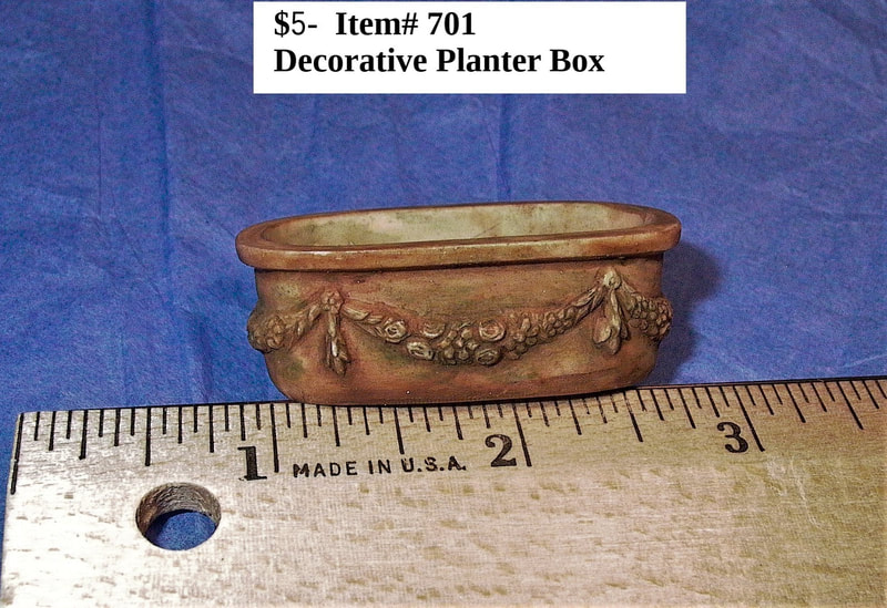 SOLD 

$5 - Item# 701 Decorative Planter Box