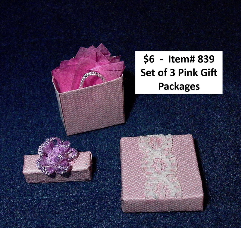 $6  -  Item# 839  -  
Set of 3 Pink Gift Packages