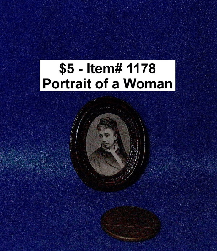 $5  -  Item# 1178 
*Portrait of a Woman Framed