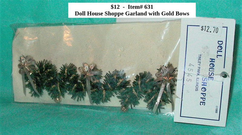 $12 - Item# 631 - Garland with Gold Bows