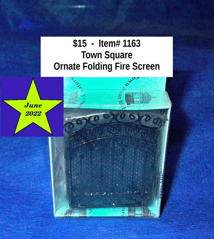 $15  -  Item# 1163 
Town Square Ornate Fire Screen