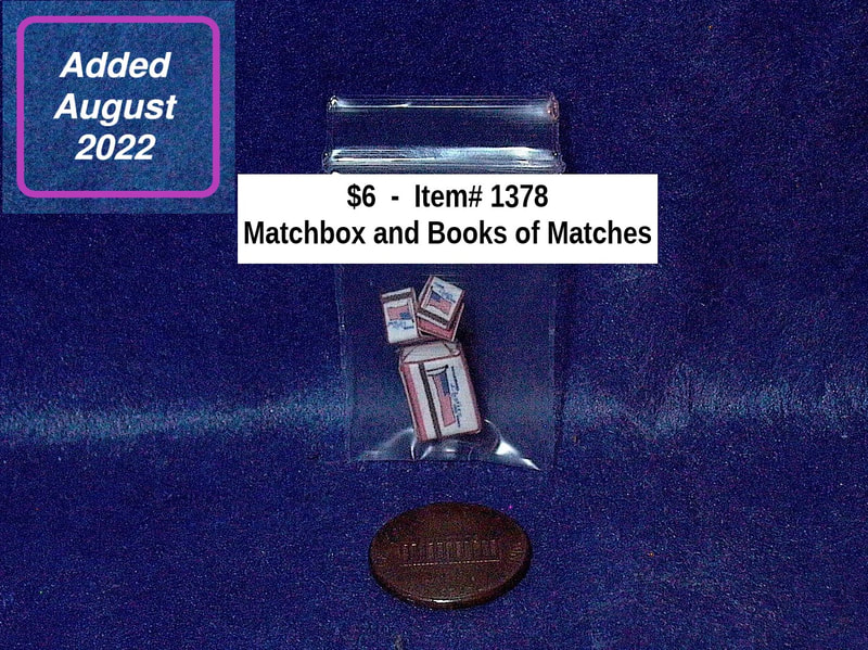 $6  -  Item# 1378 - Matchbox and Book of Matches
 