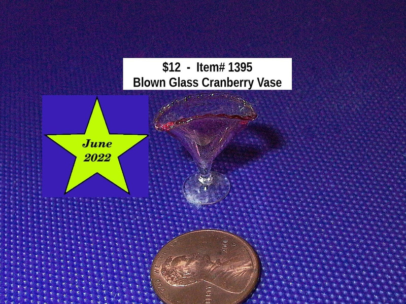 $12  -  Item# 1395 
Blown Glass Vase Cranberry