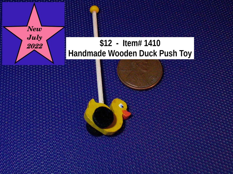 $12  -  Item# 1410 - 
Handmade Wooden Duck Push Toy