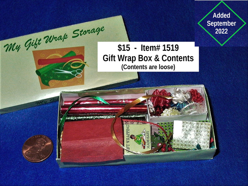$15  -  Item# 1519  -  Gift Wrap Storage Box and Contents
