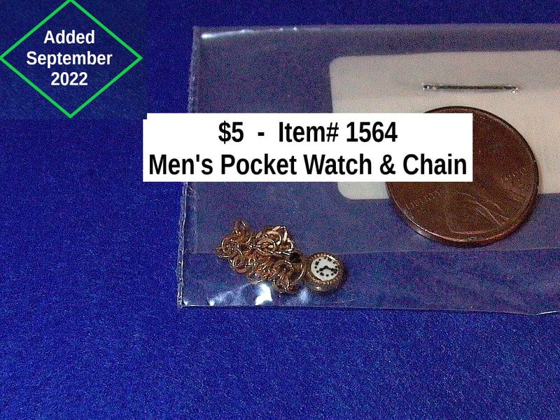 $5   -  Item# 1564 - 
 Men’s Pocket Watch and Chain