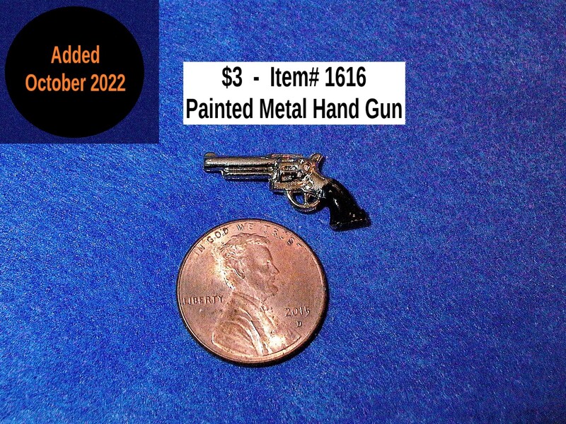 $3  -  Item# 1616  -  Painted Metal Hand Gun