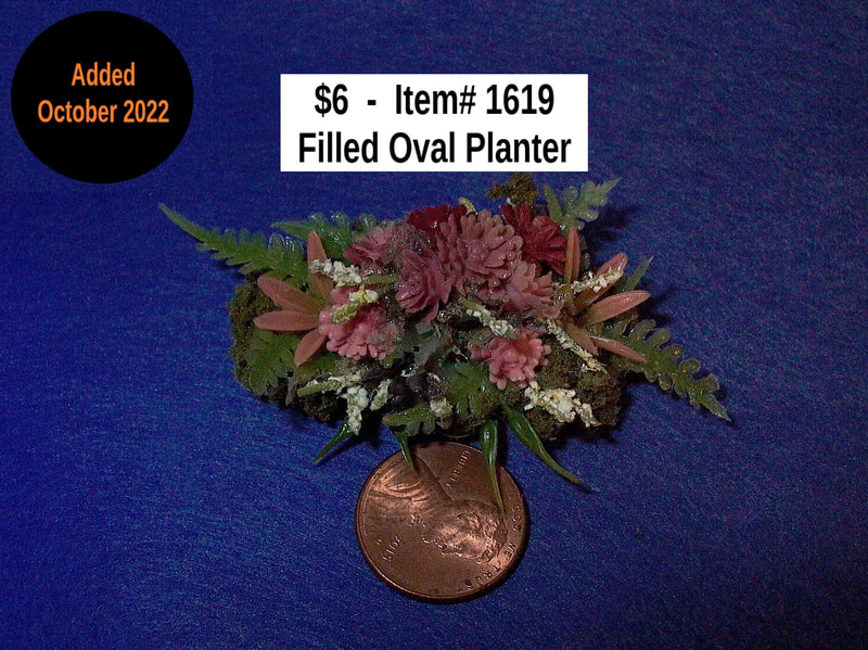 $6  -  Item# 1619  -  Oval Filled Planter