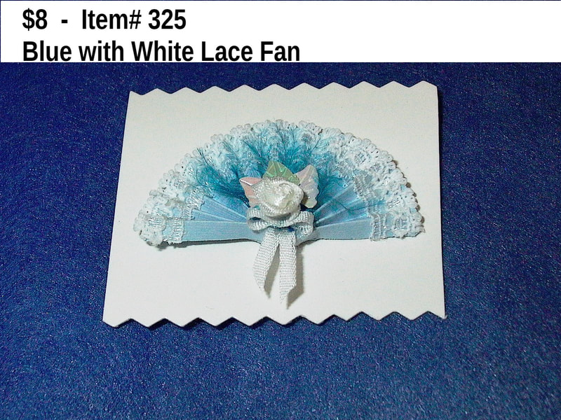 $8  -  Item# 325
Handmade Blue with White Lace Fan