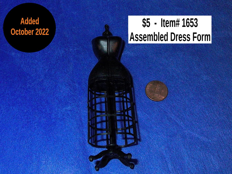 $5 - Item# 1653  -  Black Assembled Dress Form
