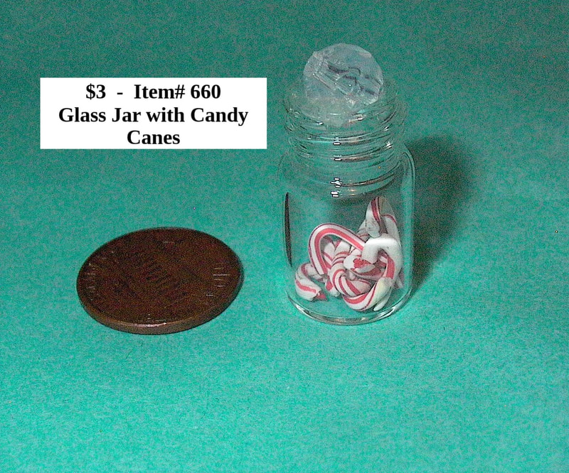 $3 - Item# 660 - Glass Jar with Candy Canes