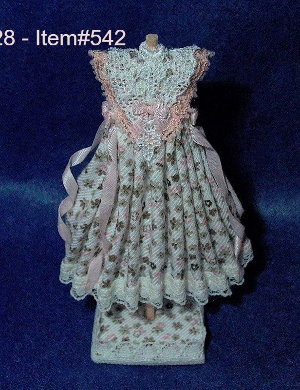 Front View Pink & Green Flower Dress on Mannequin